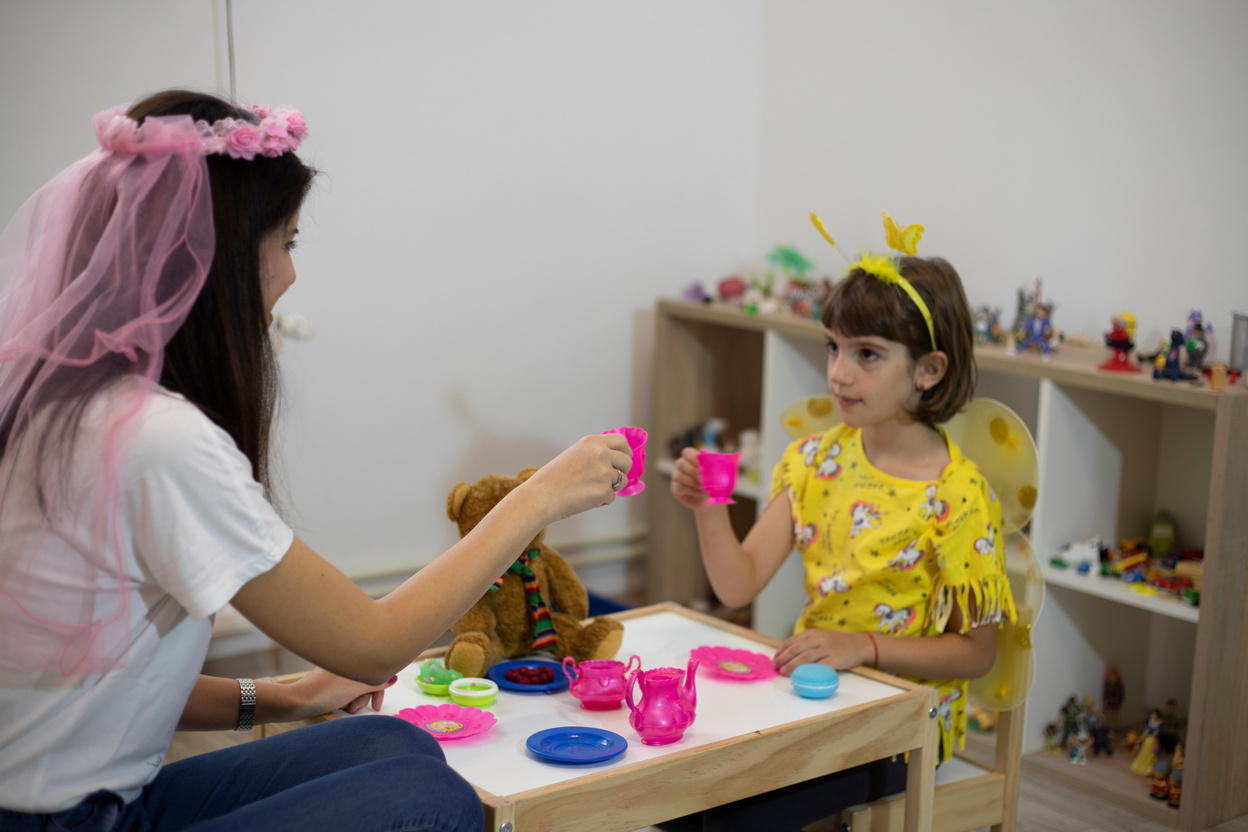 Girl attending a play therapy session